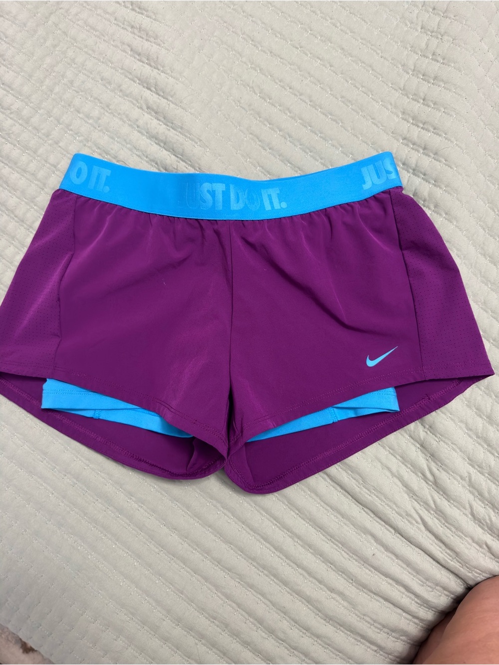 Nike Women’s Purple Athletic Shorts with Blue Waistband